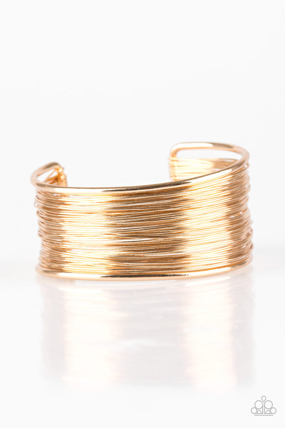 Wire Warrior - Gold cuff by Paparazzi