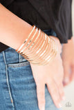 Front Line Shine - Gold Cuff Bracelet by Paparazzi